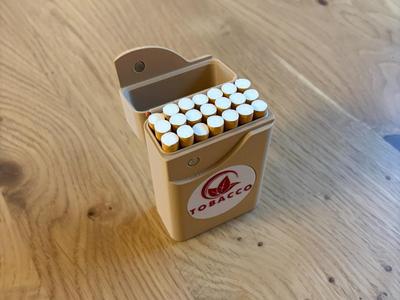 Cigarette box with magnetic closure